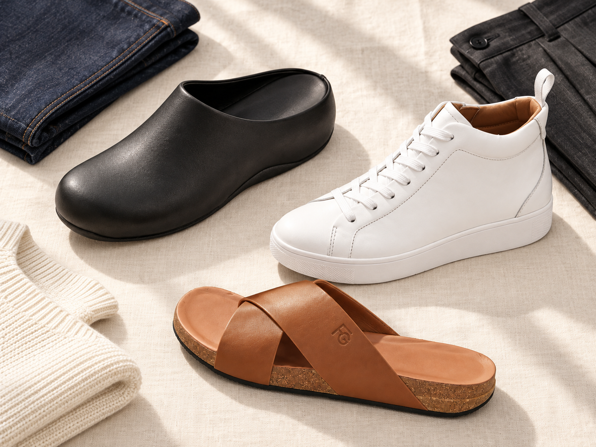 Black clog, white sneaker and tan cross slide with a neutral capsule wardrobe